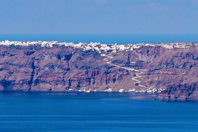 Private Motor Yacht Cruise with BBQ, Open Bar & Transfers - Red Beach gives you the first dramatic view
