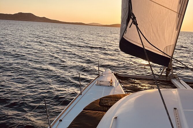 Private Mykonos Catamaran Day Cruise with Meals & Water Toys - What the Crew Adds to the Experience