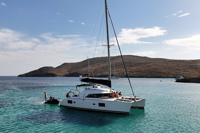 Private Mykonos Catamaran Day Cruise with Meals & Water Toys - Ornos: The Starting Point and a Protected Southern Coast