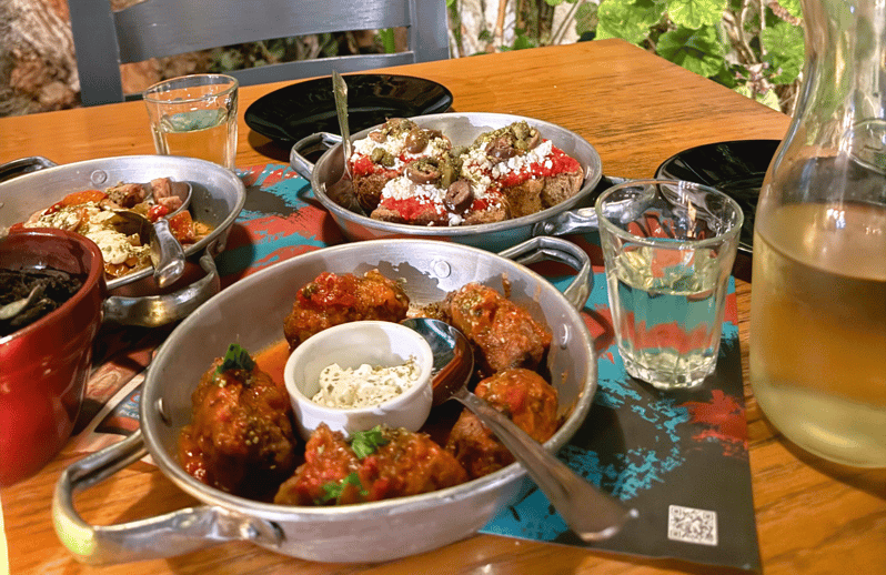 Rethymno Old Town: A Traditional Cretan Food Tour - Second stop: a local bakery and Cretan baking