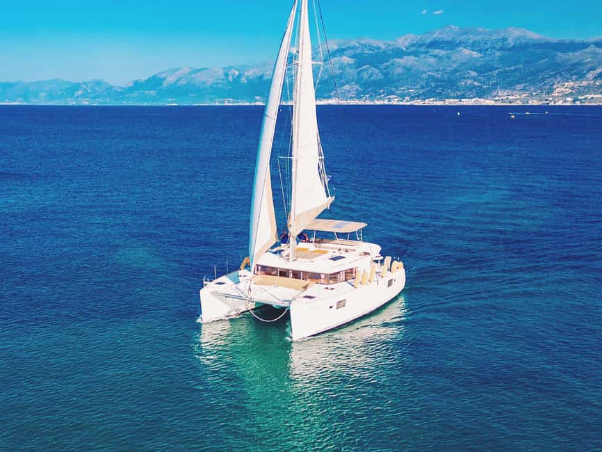 Rethymno: Sailing Catamaran Cruise with Meal & Drinks - Leaving Rethymno Marina aboard Karina