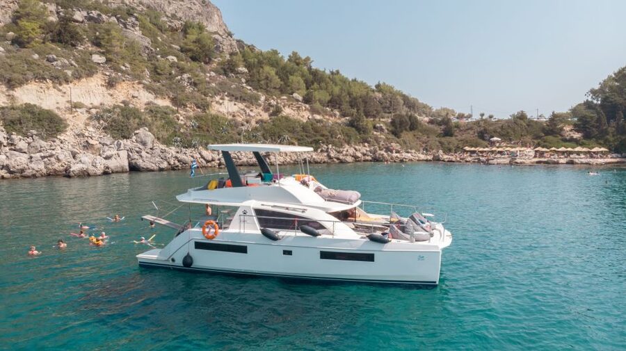 Rhodes: All-Inclusive Catamaran Cruise with Lunch and Drinks - Ladiko Bay, a quieter second water stop
