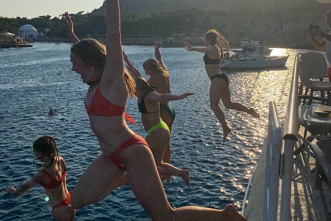 Rhodes Bay to Bay Swim Cruise-Greek Buffet w/wine included - Who will enjoy this Rhodes cruise most