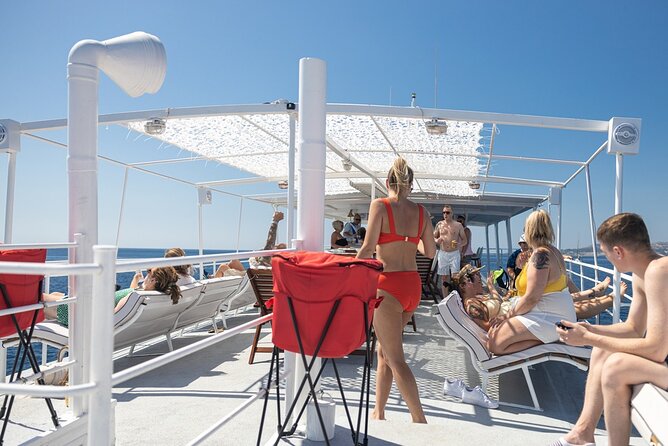 Rhodes Bay to Bay Swim Cruise-Greek Buffet w/wine included - Timing, weather, and cancellation details