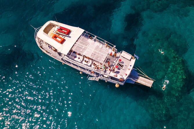 Rhodes Bay to Bay Swim Cruise-Greek Buffet w/wine included - Afandou Beach, pebbles, caves, and open water