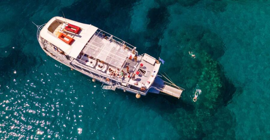 Rhodes: Bay to Bay Swim Cruise with Greek Buffet and Wine - What to pack for six hours at sea
