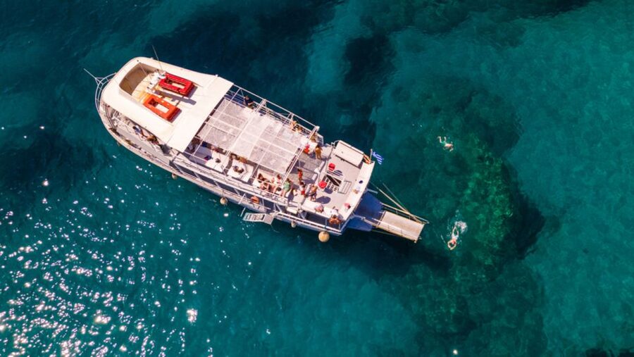 Rhodes: Bay to Bay Swim Cruise with Greek Buffet and Wine - The return to Mandraki