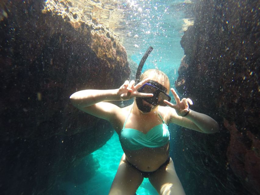 Rhodes: Beach Cruise with Swimming, Meal, & Unlimited Drinks - Traganou Caves: the most hands-on stop