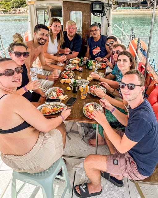 Rhodes: Captain Manolis Fishing Trip with BBQ and Swimming - Swimming and snorkeling near a Rhodes beach