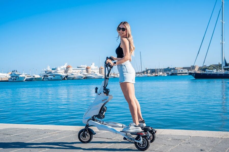 Rhodes: City Highlights and Medieval Town Trikke Tour - The National Theater and Mandraki Harbor