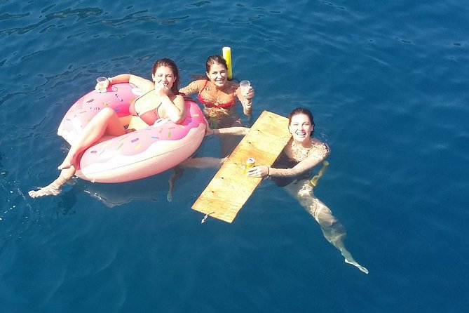 Rhodes Exclusive Swim Cruise Cocktail Open bar & Gourmet Buffet - Starting at Mandraki Harbour with Rhodes Old Town in View