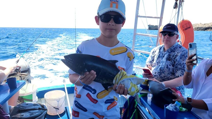 Rhodes: Fishing Trip, Snorkelling, BBQ, & Professional Guide - Two hours of ground fishing near the seabed