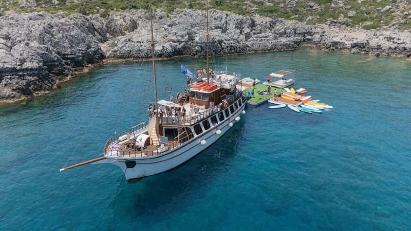 Rhodes: Gulet Trip with Food, Drinks, SUP, Kayak & Swimming - Ladiko Bay and the floating Fun Island