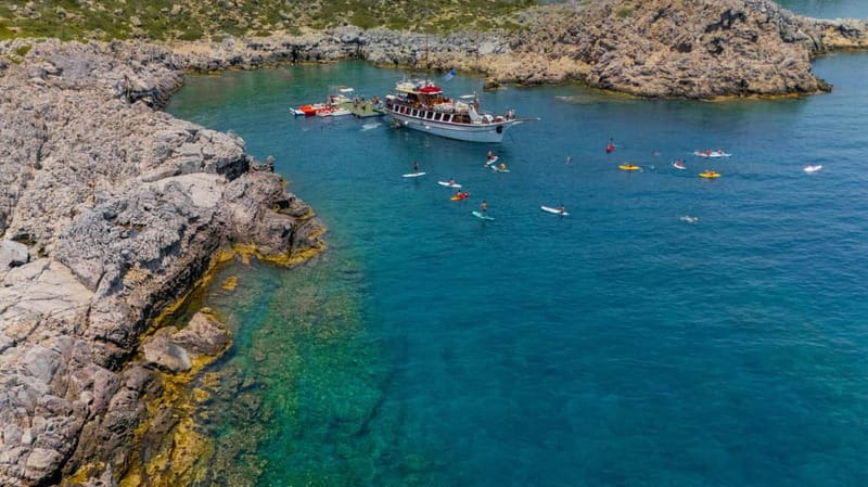 Rhodes: Gulet Trip with Food, Drinks, SUP, Kayak & Swimming - A Greek lunch served on deck
