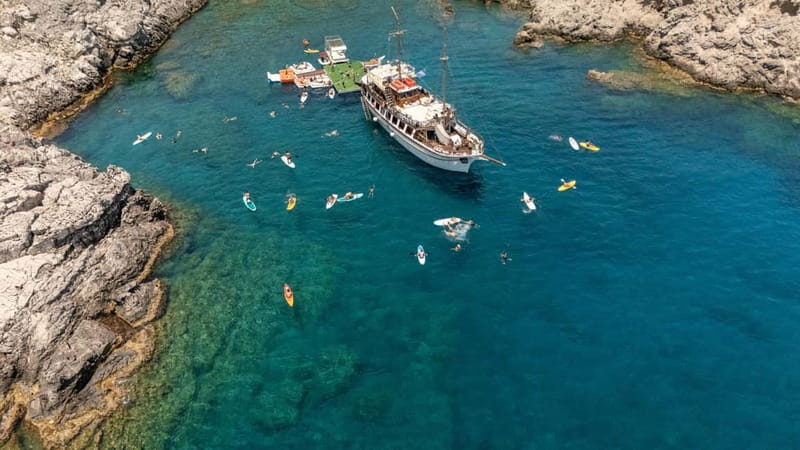 Rhodes: Gulet Trip with Food, Drinks, SUP, Kayak & Swimming - What the $78 price really covers