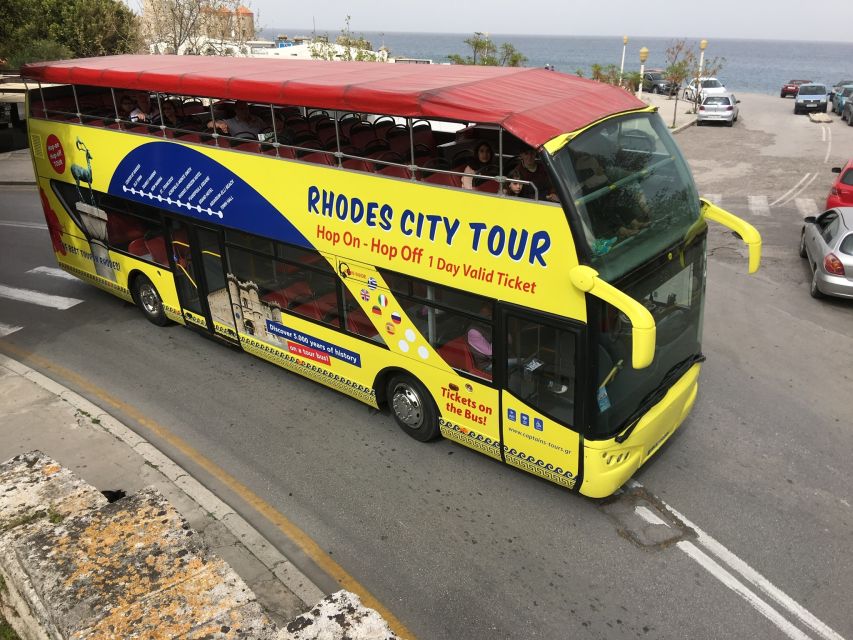 Rhodes: Hop-on Hop-off Bus and Submarine Tour - Boarding the Poseidon Submarine at Mandraki Harbor