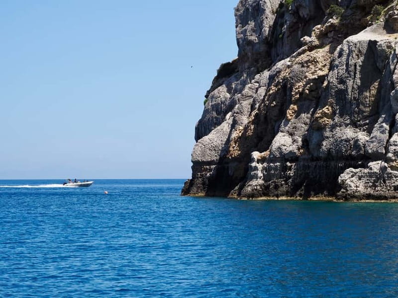 Rhodes: RIB Cruise with Drinks and 4 Swim Stops - Traganou brings rocks, gravel, and sea caves
