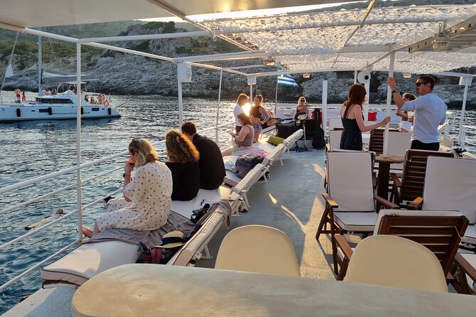Rhodes Sunset Cruise - Swim and Dine w/ Live Music & Sunset! - Greek dinner buffet after the swim