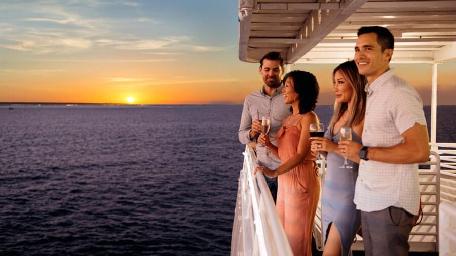Rhodes: Sunset Cruise with Live Music, Wine & Greek Buffet - Leaving Rhodes with the old city in view