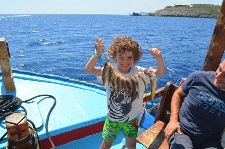 Rhodes Town: Fishing Boat Trip with Fish Meal and Swim Stops - Meeting the crew at Mandraki Harbor