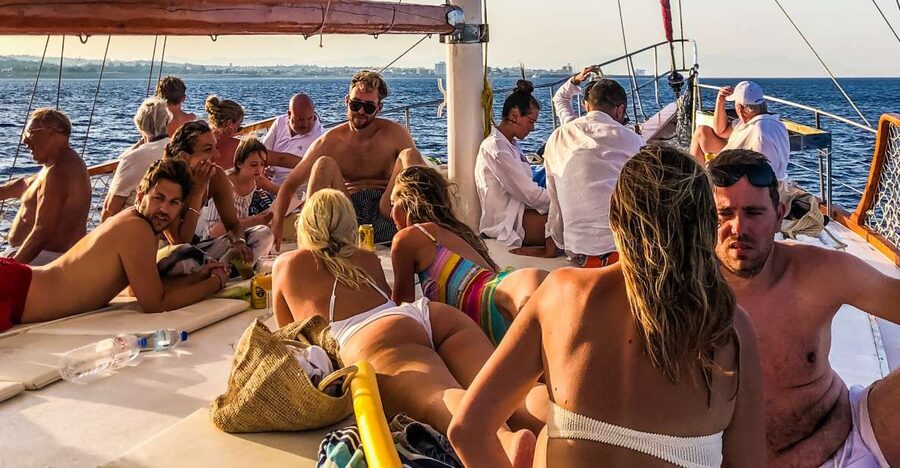 Rhodes Town: Sunset Boat Cruise with Drinks & Snacks - Kallithea Springs: the main swimming stop