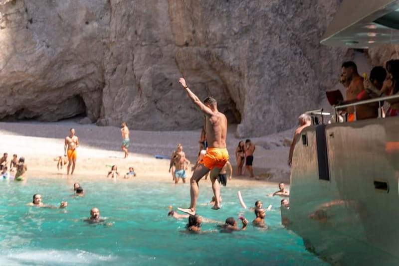 Rhodes: Transfer & Cruise to Symi Island & St. George Bay - Boarding Doll at Mandraki Harbour