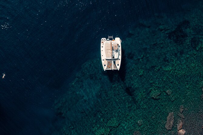 Romantic Sunset Catamaran Caldera Cruise incl. Meal & Drinks - Pickup, timing, and the port arrangements
