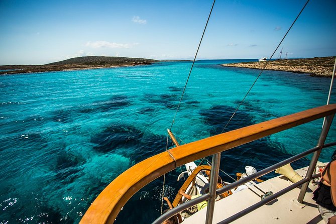 Round of Antiparos & Despotiko with Traditional Boat - Pantheronisia Blue Lagoon and the swimming stops