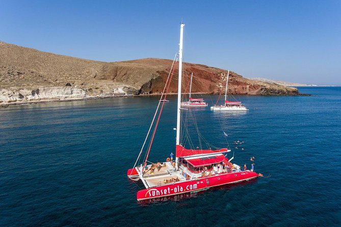 Sailing Catamaran Cruise in Santorini with BBQ, Drinks and Transfer - Why a boat is one of the best ways to see Santorini