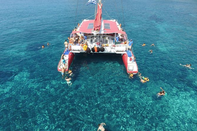 Sailing Catamaran Cruise in Santorini with BBQ, Drinks and Transfer - White Beach, barbecue, and the longest stop