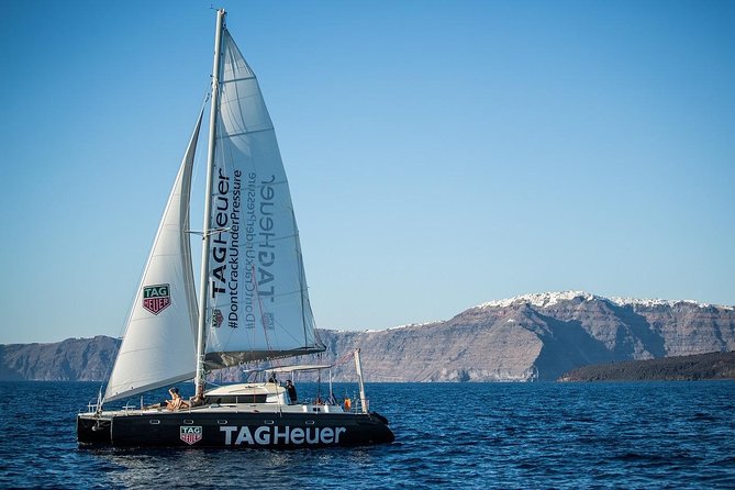 Santorini Adventurous Catamaran Experience with Snorkeling - White Beach and the quieter side of Santorini