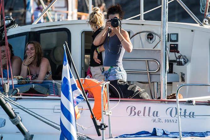 Santorini Adventurous Catamaran Experience with Snorkeling - Nea Kameni hot springs and the warm sulphur water