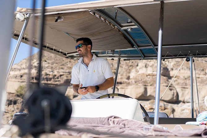 Santorini All-inclusive Catamaran Cruise with Thirassia Stop - White Beach and Red Beach photo stops