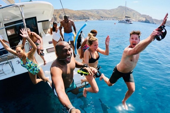 Santorini All-inclusive Catamaran Cruise with Thirassia Stop - Lunch, local wine, and the relaxed part of the day