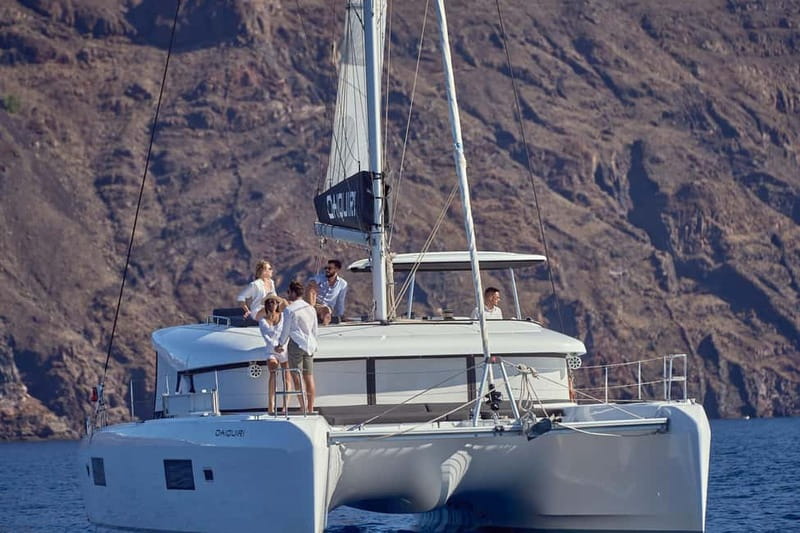 Santorini: Caldera Classic Catamaran Cruise w/ Meal & Drinks - Swimming beside volcanic Nea Kameni