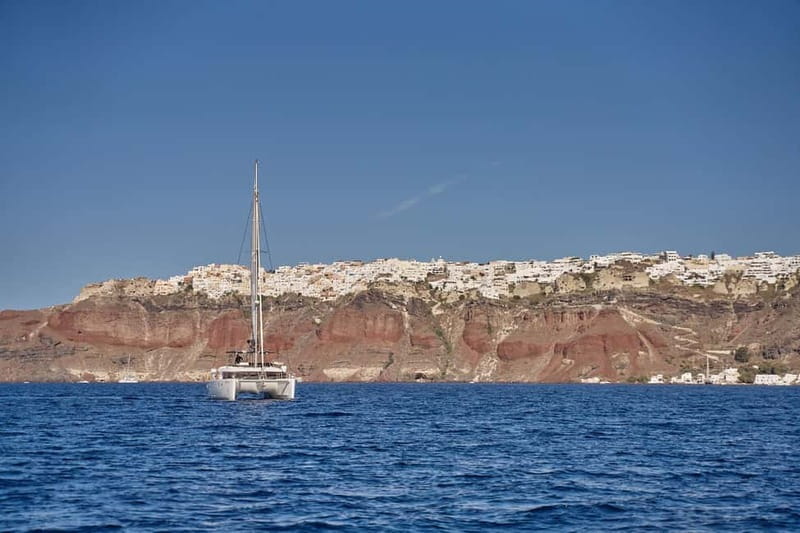 Santorini: Caldera Classic Catamaran Cruise w/ Meal & Drinks - Sunset from the water, or a calmer morning sail