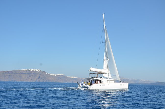Santorini Caldera Gold Day Cruise with BBQ on board and Open Bar - Lunch and swimming near Thirassia
