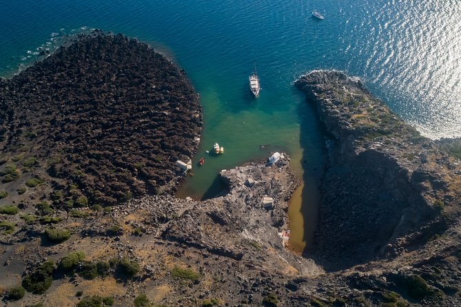 Santorini Caldera Morning Cruise With King Thiras Boat - Palea Kameni: warm water 50 meters from shore