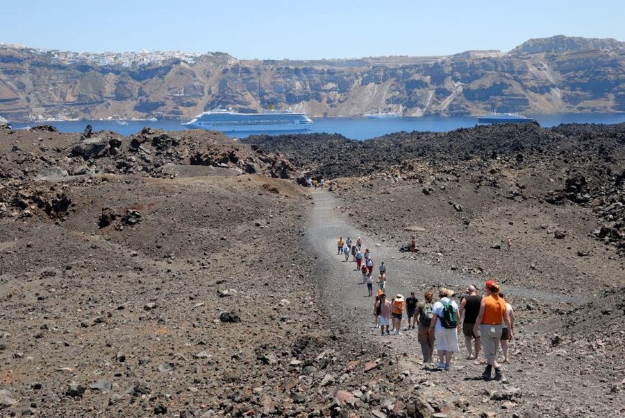 Santorini Caldera: Sunset Cruise with Dinner - Sunset in Oia, after the cruise