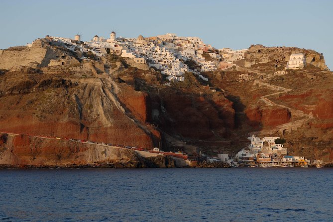 Santorini Caldera Sunset Sailing Cruise with Dinner and Wine - Greek food and wine near Thirassia Bay