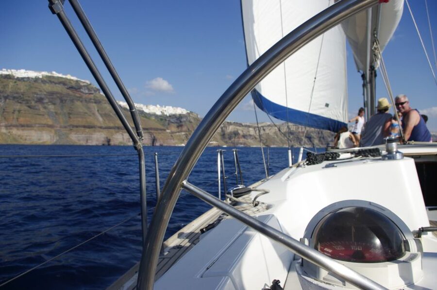 Santorini Caldera: Sunset Sailing Cruise with Meal - Mesa Pigadia: Your First Main Swim