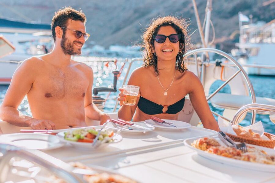 Santorini Caldera: Sunset Sailing Cruise with Meal - A Seafood Barbecue With Local Drinks
