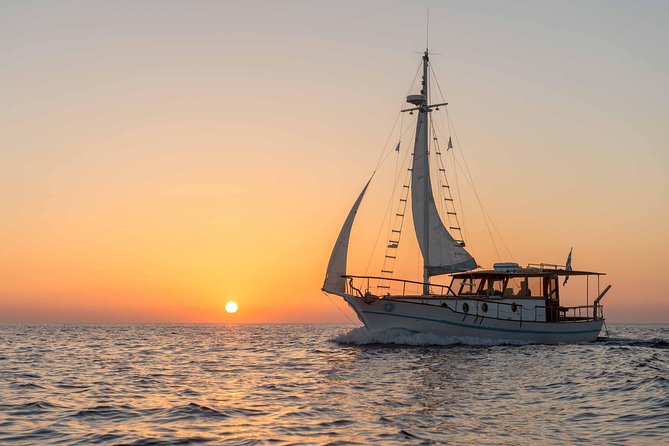 Santorini Caldera Sunset Traditional Cruise with Meal and Drinks - Thirassia: first swim and an onboard Greek meal