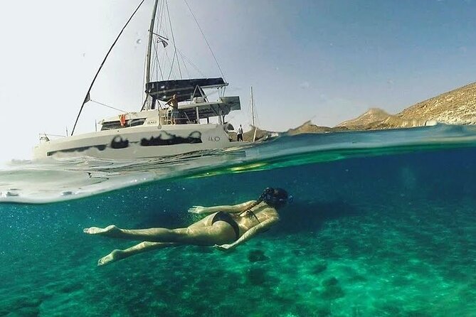 Santorini Catamaran Cruise with Fresh Meal and Open Bar - Palea Kameni and the sulfur-tinted hot springs