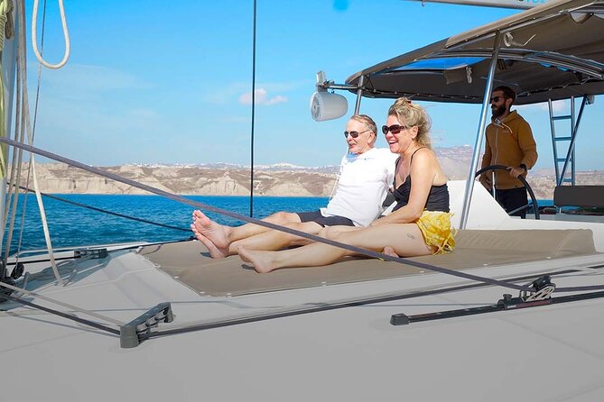 Santorini Catamaran Cruise with Greek Meal, Open-Bar and Sunset - Sunset from the catamaran