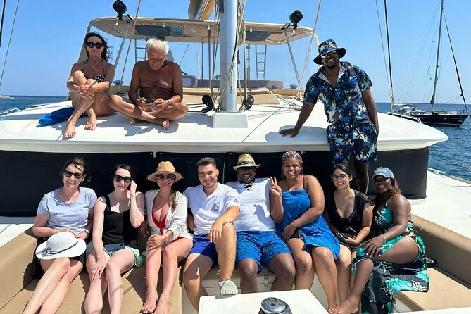 Santorini Catamaran Cruise: with Lunch, BBQ, Open Bar, Transfers - Red Beach: Santorini’s most dramatic shoreline