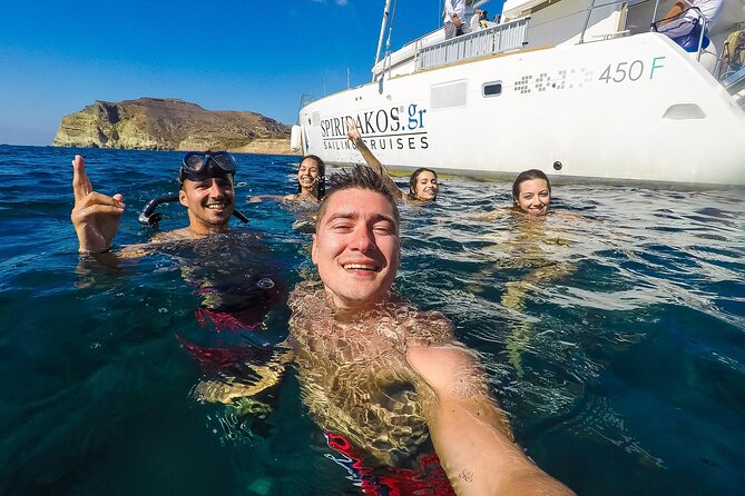 Santorini Classic Catamaran Cruise with BBQ, Drinks and Transfers - The Caldera, Lighthouse, and Volcanic Islands