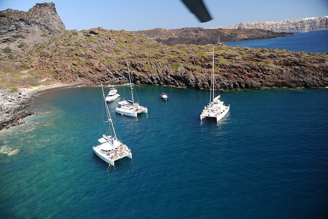 Santorini Classic Catamaran Cruise with BBQ, Drinks and Transfers - Crew, Boat Comfort, and Group Size