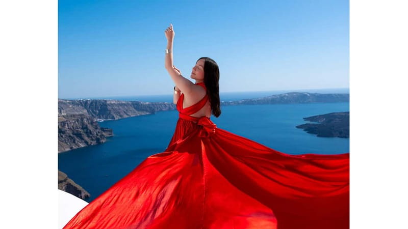 Santorini: Flying Dress Photoshoot with Edited Photos - Meeting in Imerovigli, with Oia as an option