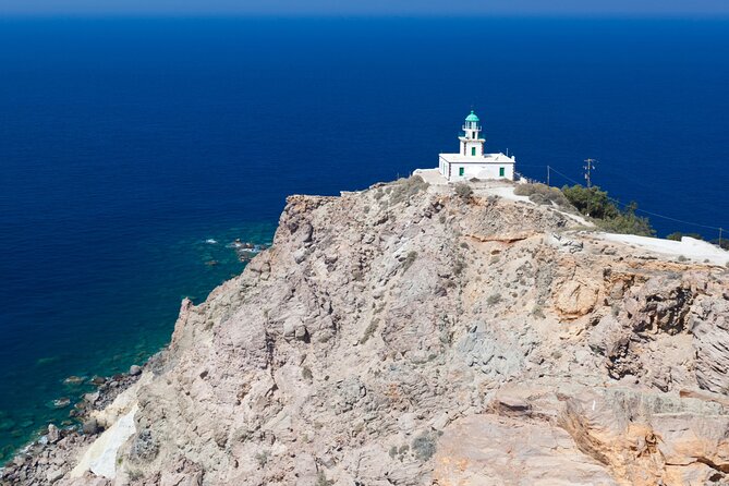 Santorini: Full Island Tour & Sunset with Local Guide & Pick-up - Akrotiri Lighthouse: a quiet 15-minute coastal view